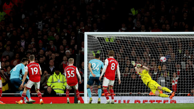 Southampton defender Duje Caleta-Car pictured (left) scoring a goal during his team's away game at Arsenal in April 2023